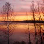 A beautiful sunset overlooking a lake